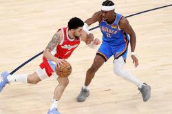 lol官网-灰熊客场惊险取胜马刺，结束连败